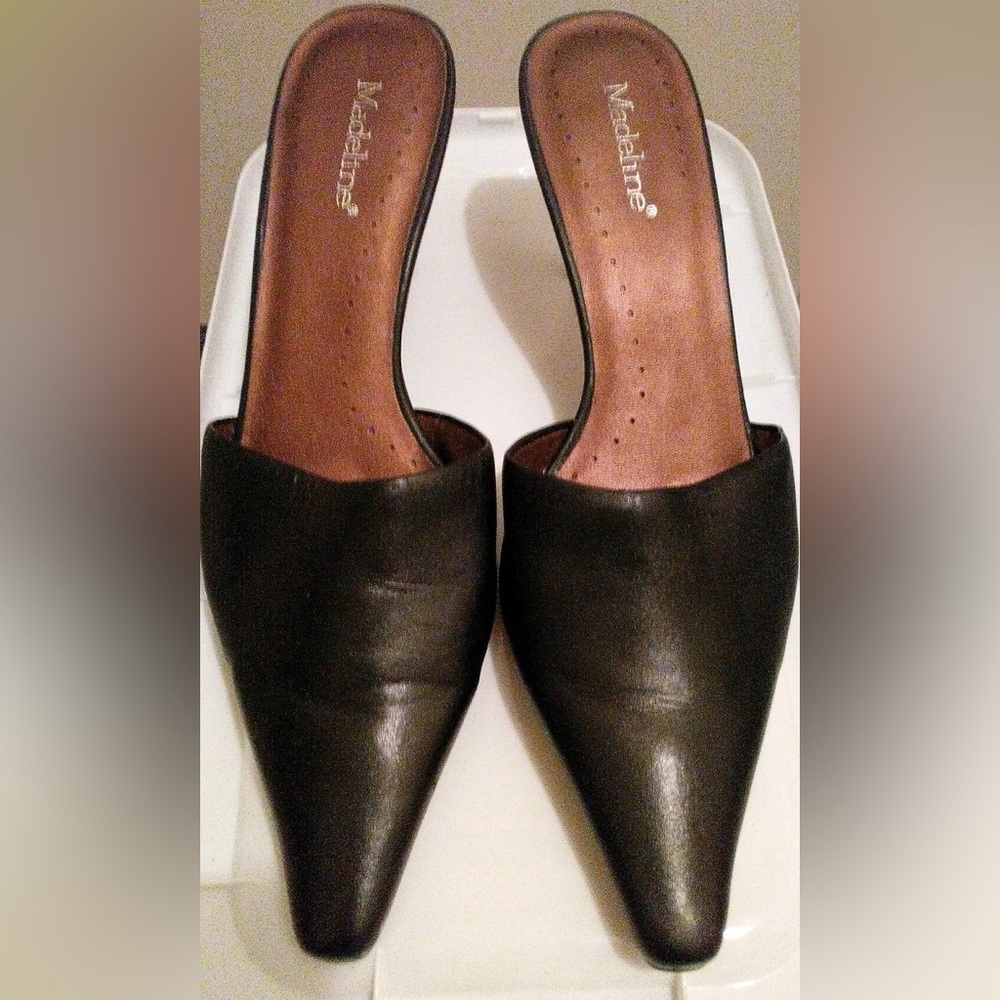 Black mid-heeled, open back Madeline brand pump